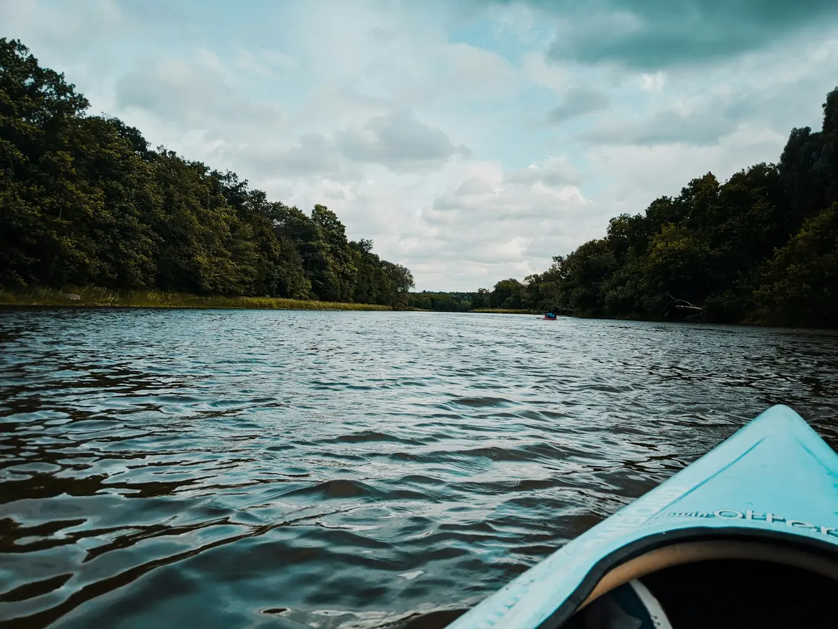 Kayaking on the tree-lined Grand River in Cambridge, Ontario