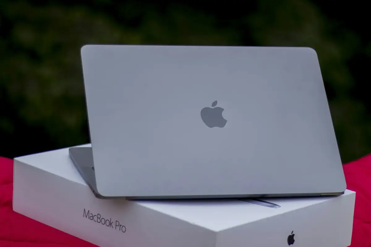 New space grey MacBook Pro resting on its box